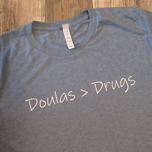 Doulas (are greater than) Drugs Unisex Tee